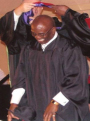 Pastor receiving his Masters Degree
